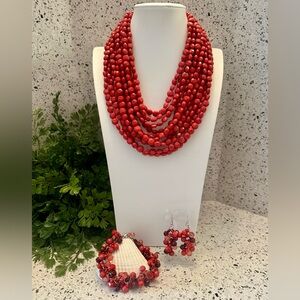 Red multi strand acrylic bead necklace with bracelet and earrings